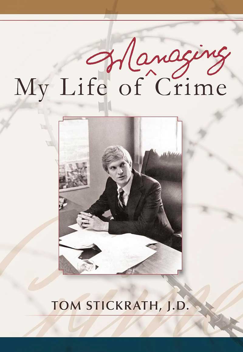 Book cover titled "Managing My Life of Crime" by Tom Stickrath, J.D. Features a black-and-white photo of a man in a suit at a desk, with barbed wire graphics in the background.
